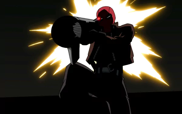 HD desktop wallpaper featuring Red Hood, aka Jason Todd, from the movie Batman: Under the Red Hood, poised with a weapon against a dynamic explosion backdrop.