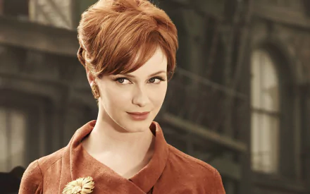 HD desktop wallpaper featuring American actress and celebrity Christina Hendricks with a vintage-style background.