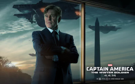 HD wallpaper featuring Robert Redford as Alexander Pierce from the movie *Captain America: The Winter Soldier*, showcasing a dramatic background with a skyline and futuristic aircraft.