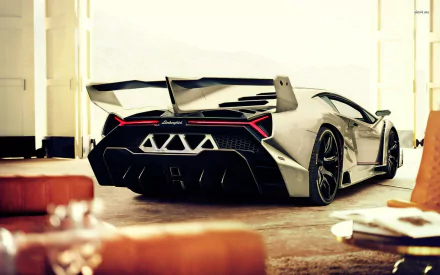 HD desktop wallpaper featuring the sleek and stylish Lamborghini Veneno, showcasing the rear view of the vehicle in a modern indoor setting.