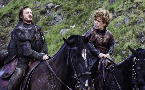 HD desktop wallpaper featuring Jerome Flynn as Bronn and Peter Dinklage as Tyrion Lannister from the TV show Game of Thrones, both on horseback in a grassy landscape.