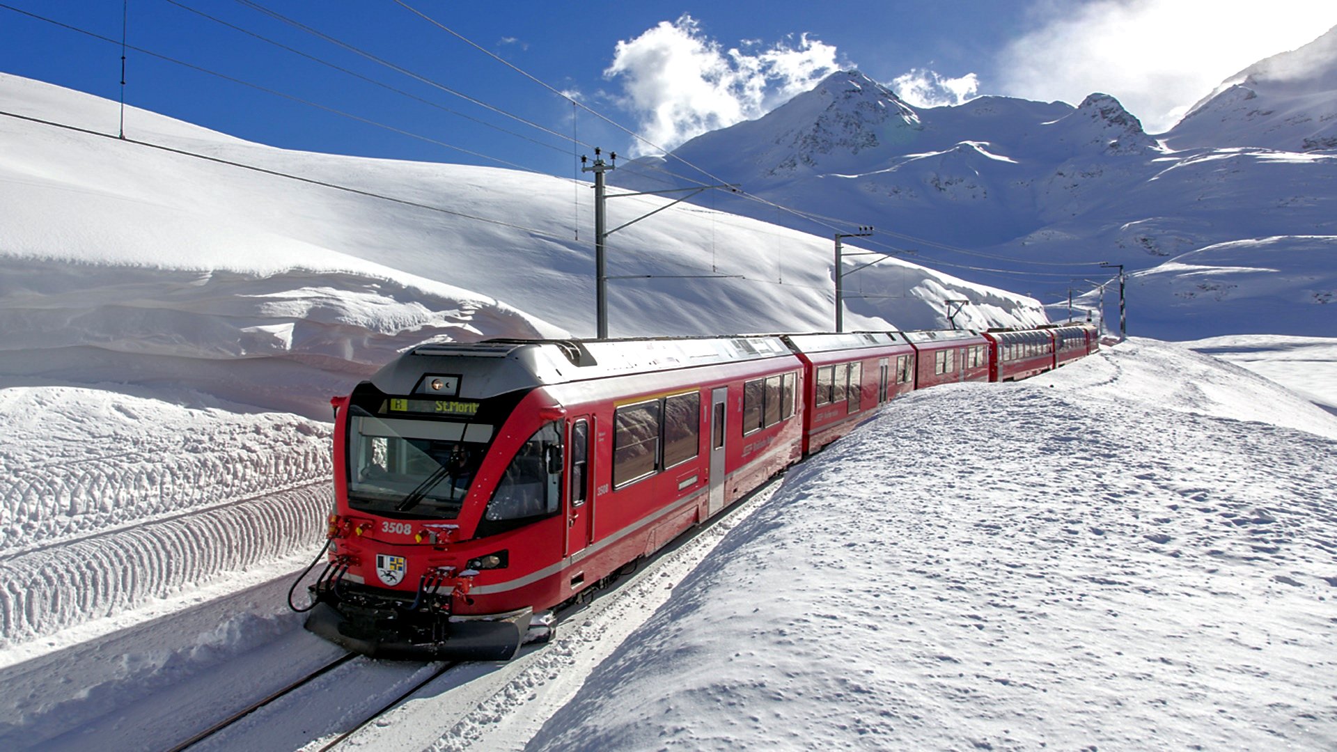 Train Running Through the Mountains of Switzerland by Adnan Akhtar