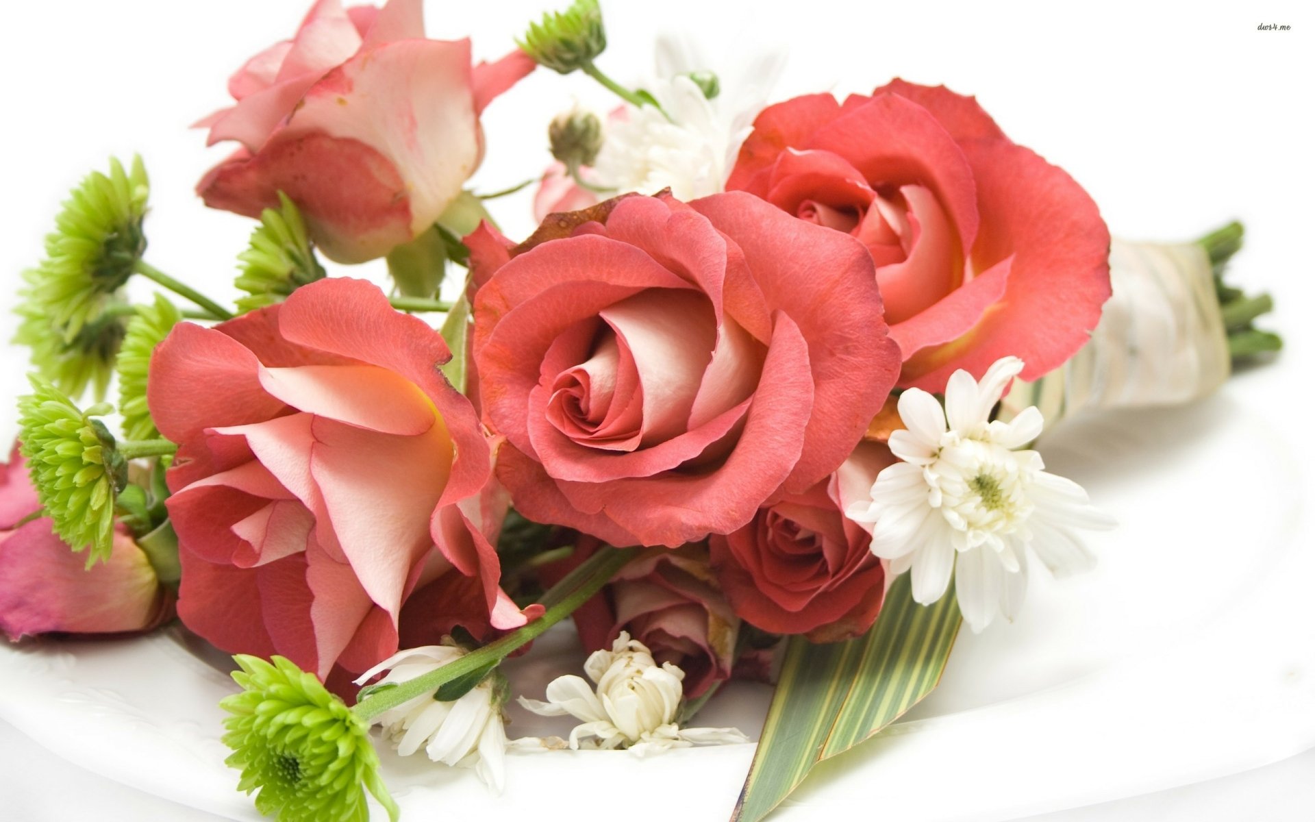 A vibrant arrangement of pink roses and white flowers, beautifully showcasing nature's elegance. This HD desktop wallpaper brings a touch of floral beauty to any background.