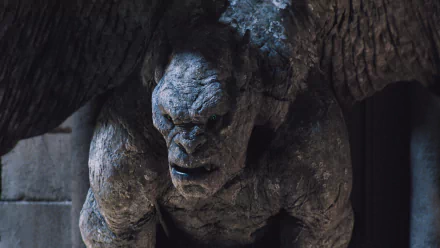 HD PC desktop wallpaper featuring a close-up of a menacing stone gargoyle from the movie Frankenstein, showcasing detailed textures and dramatic lighting.