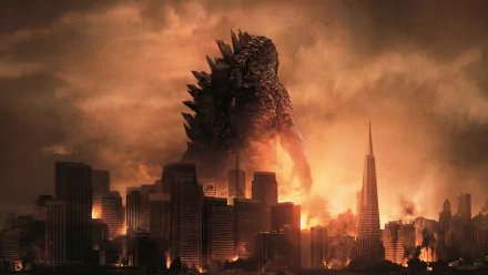 HD desktop wallpaper featuring Godzilla from the 2014 movie towering over a fiery cityscape at dusk.