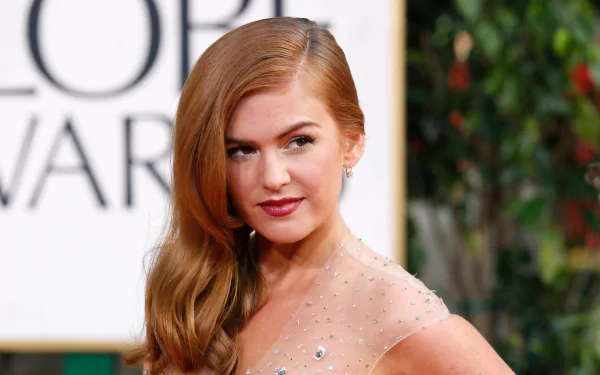 HD desktop wallpaper featuring Australian actress and celebrity Isla Fisher in an elegant pose at a glamorous event.