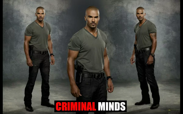 A high-definition desktop wallpaper featuring a character from the TV show Criminal Minds, showcasing a strong figure in a casual outfit against a textured background.