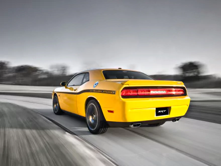 Yellow Dodge Challenger SRT8 392 muscle vehicle (Dodge Challenger) racing on a blurred road - HD PC desktop wallpaper and background