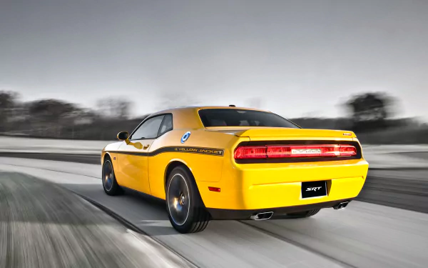 Yellow Dodge Challenger SRT8 392 muscle vehicle (Dodge Challenger) racing on a blurred road - HD PC desktop wallpaper and background