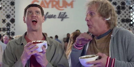 HD desktop wallpaper featuring a scene from Dumb and Dumber To with the main characters excitedly holding bowls.