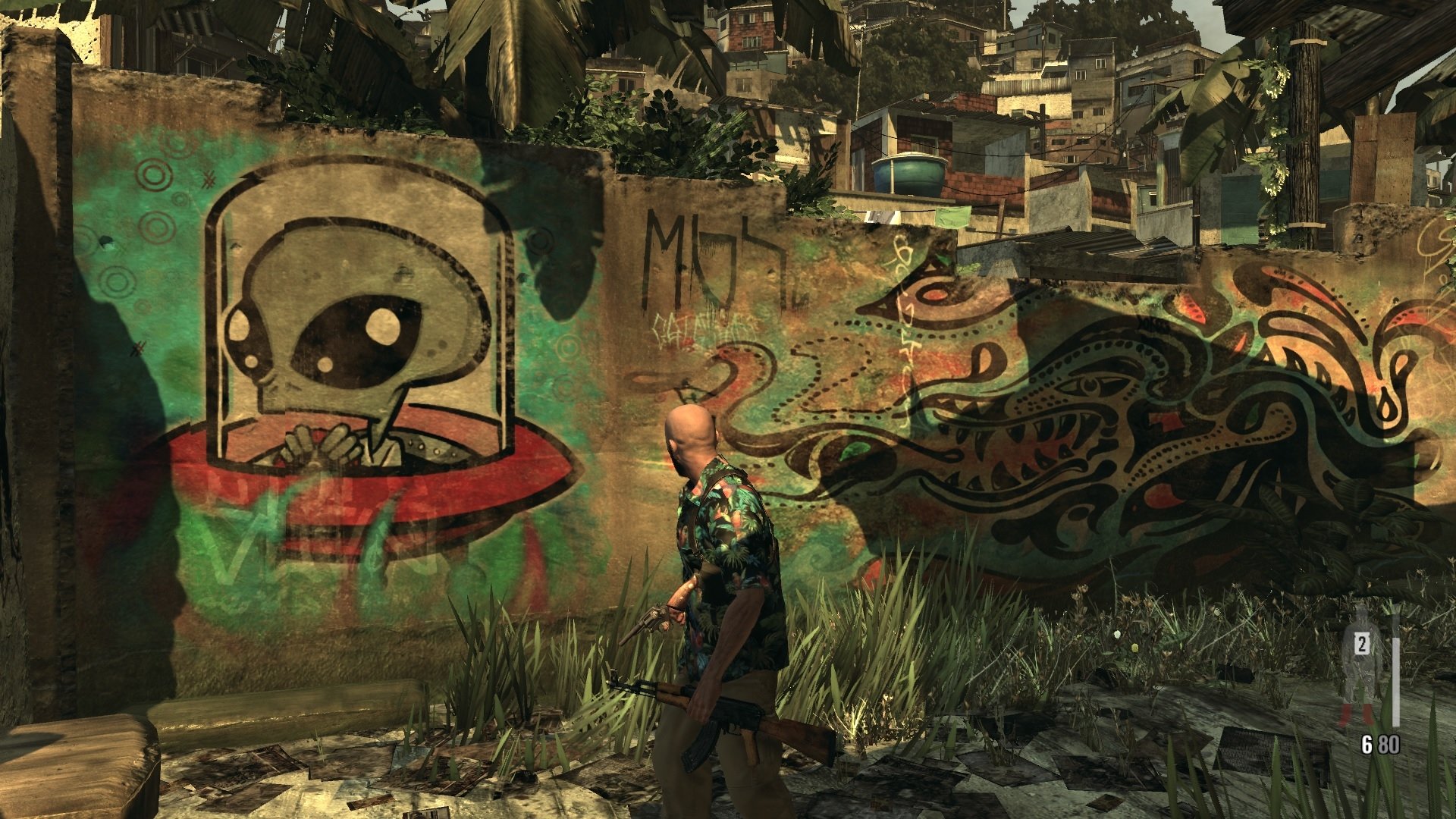 HD PC desktop wallpaper from the video game Max Payne 3: armed protagonist in a sunlit favela alley before graffiti of a cartoon alien in a UFO and a sprawling mural.
