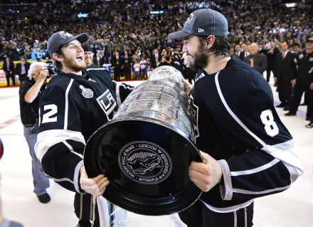 Los Angeles Kings players celebrating with the Stanley Cup, HD desktop wallpaper.
