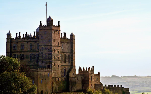 HD desktop wallpaper showcasing the man-made Bolsover Castle against a clear sky with distant landscape views.