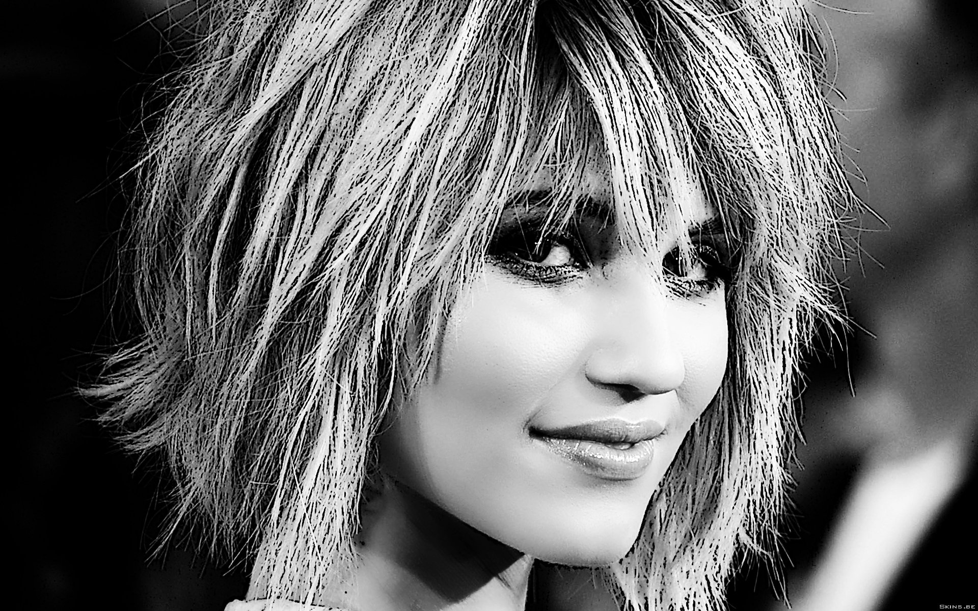 Black and white HD desktop wallpaper featuring a close-up portrait of American actress and celebrity Dianna Agron with textured, layered hair and a subtle smile.