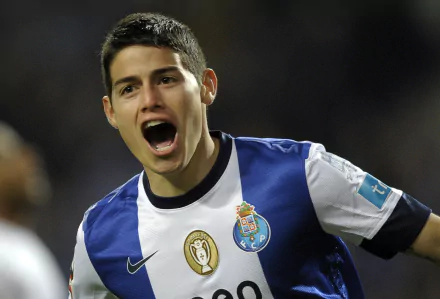 HD desktop wallpaper featuring James Rodriguez in an FC Porto jersey celebrating during a game.