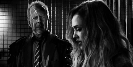 Black-and-white HD desktop wallpaper featuring Bruce Willis and Jessica Alba from the movie Sin City: A Dame to Kill For.