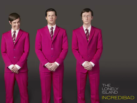 HD desktop wallpaper featuring three individuals in bright pink suits against a grey background, marked with the text The Lonely Island.