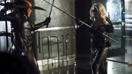 Action-packed scene from Arrow TV show featuring Caity Lotz as Black Canary in a dynamic fight, captured as an HD PC desktop wallpaper and background.