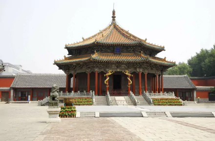 A stunning HD wallpaper of a traditional Chinese temple, featuring intricate dragon motifs, highlighting its religious significance and vibrant architectural details.