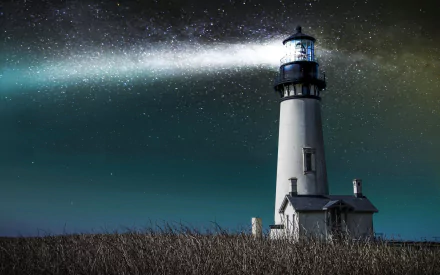 A stunning HD wallpaper featuring a lighthouse against a starry night sky, with its beam cutting through the darkness, surrounded by tall grass.