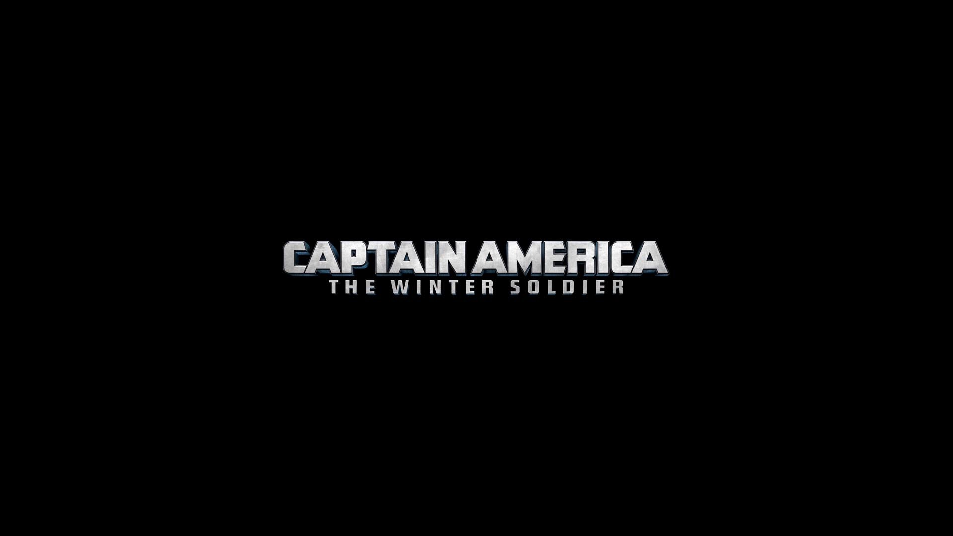 A sleek HD desktop wallpaper featuring the title logo of the movie Captain America: The Winter Soldier against a black background.