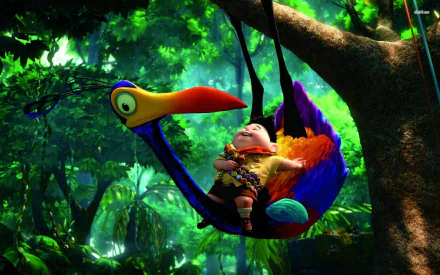 A vibrant HD desktop wallpaper from the movie Up, featuring a young boy happily resting in a colorful bird's embrace amidst a lush, green jungle backdrop.