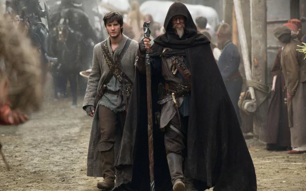 4K Ultra HD desktop wallpaper featuring a scene from the movie Seventh Son with two characters walking through a medieval village street.