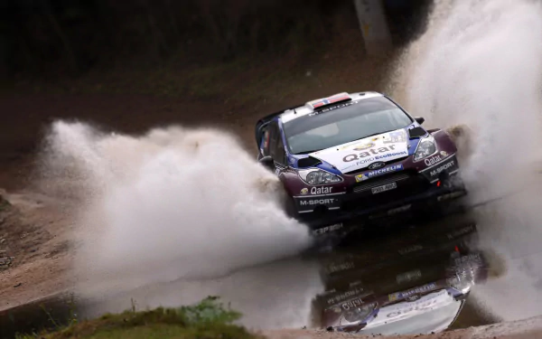 Rallying, Sports: rally car splashing through a water crossing with spray and reflection — HD PC desktop wallpaper/background.