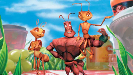 HD PC desktop wallpaper from the movie Antz: three stylized ants—a brawny red ant flanked by two companions—posed among oversized picnic items under a bright blue sky.