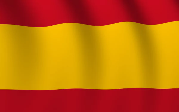 HD desktop wallpaper featuring the vibrant flag of Spain with its red and yellow horizontal stripes waving gently.