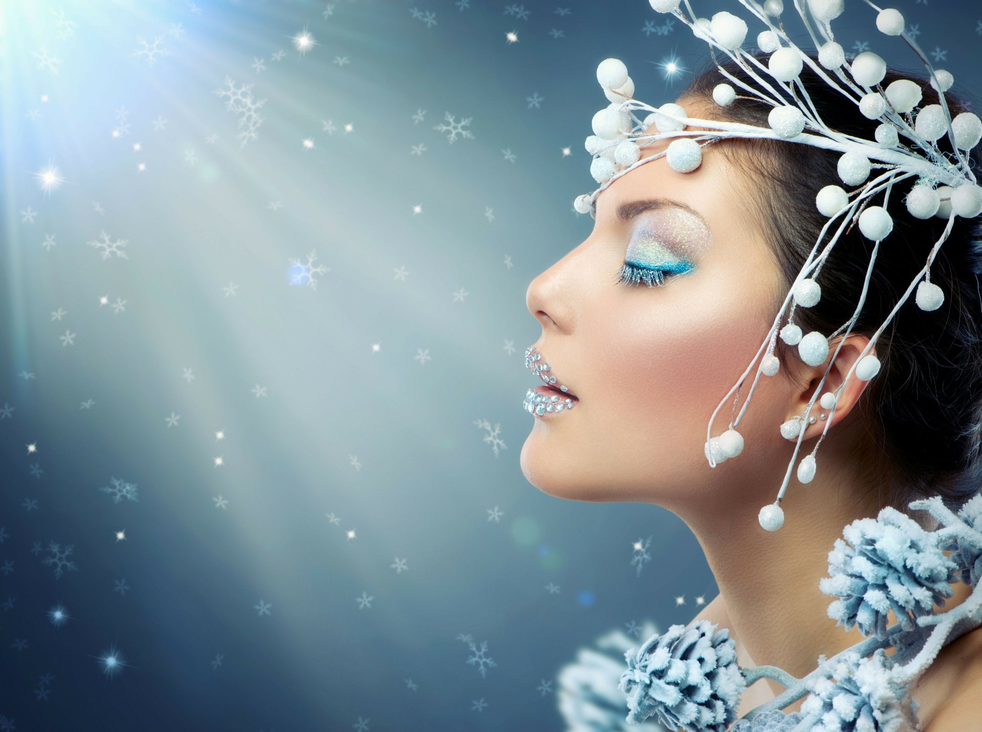 Close-up of a woman's face adorned with white decorative elements and frosty makeup, set against a softly lit background, captured in 4K Ultra HD for PC desktops.