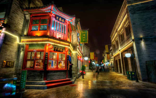 Vibrant Beijing street scene featuring a traditional red building adorned with lights, showcasing the blend of culture and modernity in urban China. 4K Ultra HD wallpaper.