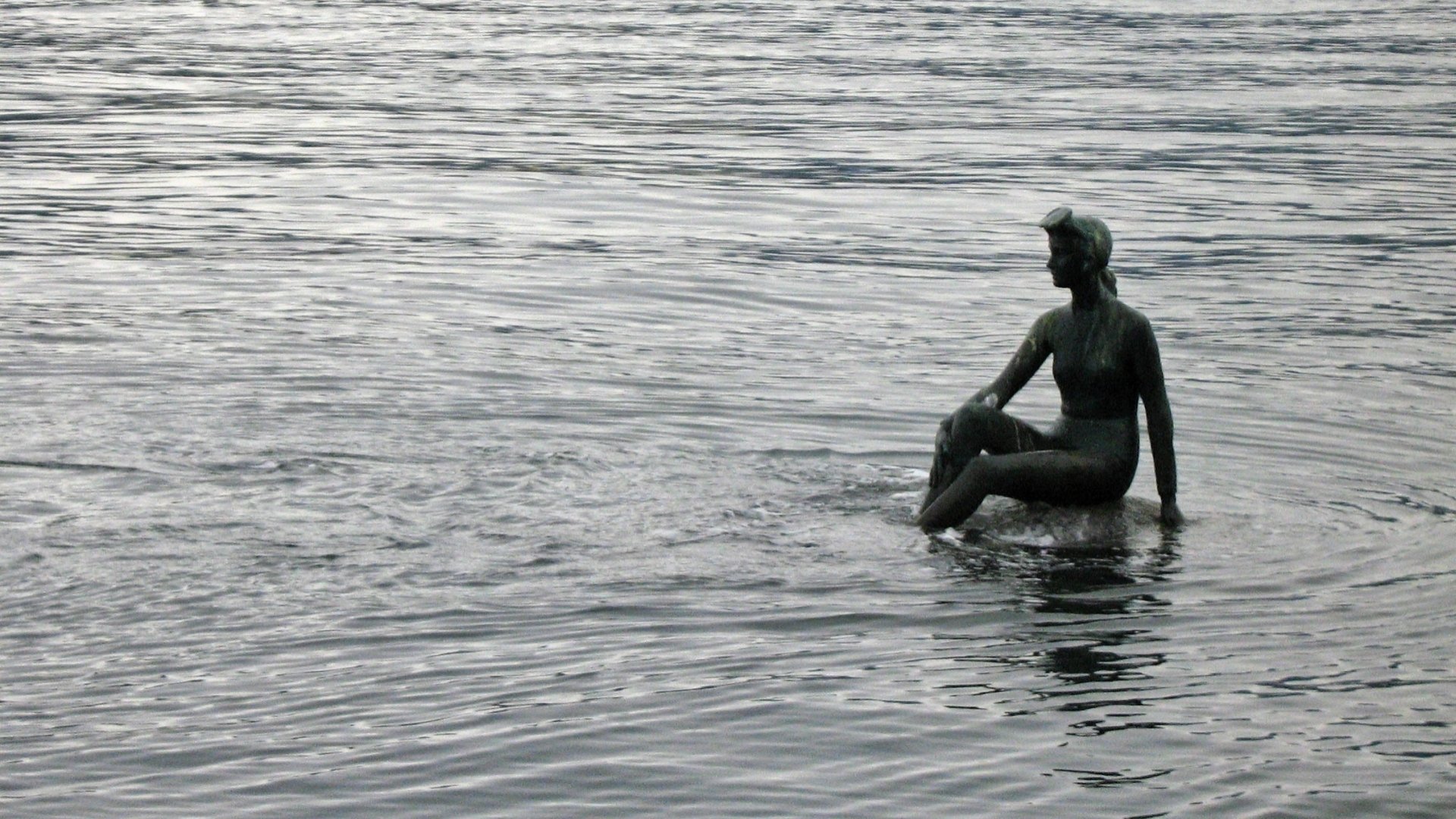 Download Man Made Girl In A Wetsuit Statue HD Wallpaper