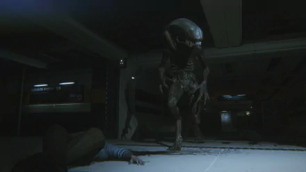 HD PC desktop wallpaper from the video game Alien: Isolation: a Xenomorph stalking a fallen crew member in a dim, industrial corridor.