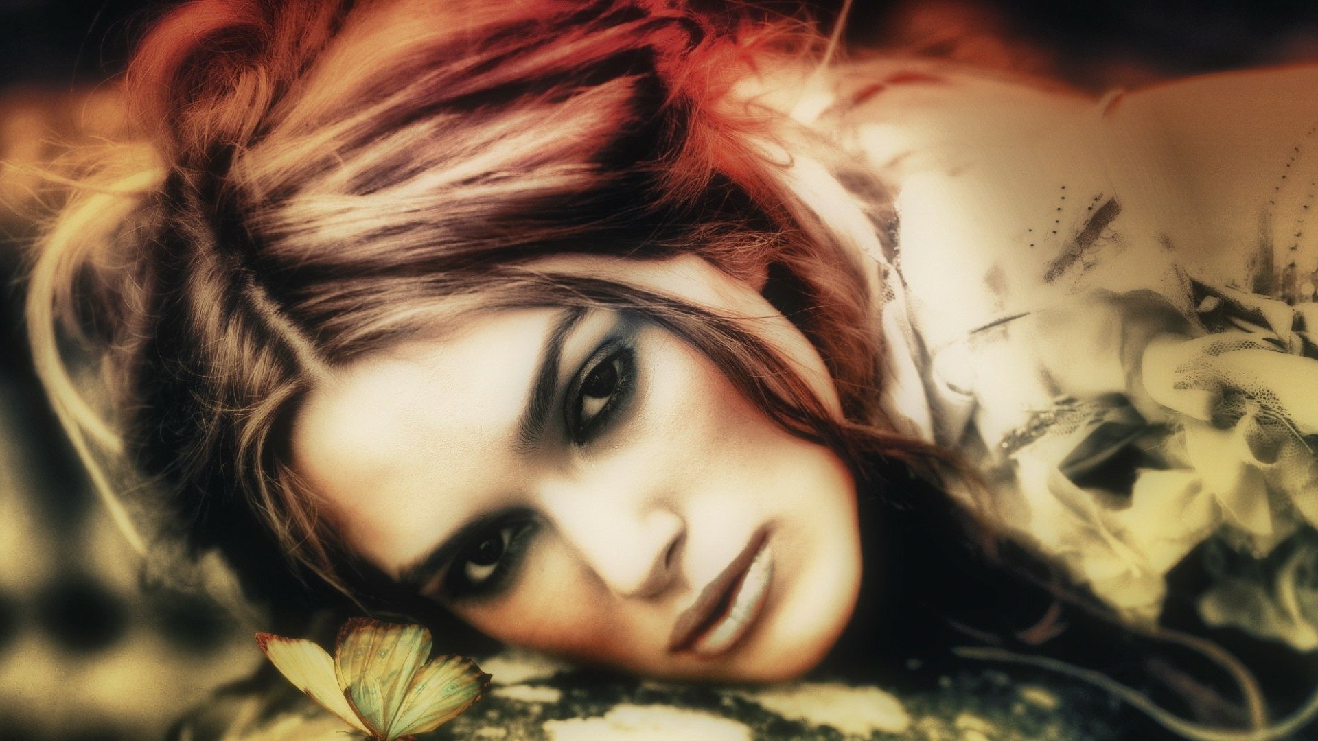 HD desktop wallpaper featuring celebrity Keira Knightley with soft lighting and a warm, artistic blur effect.