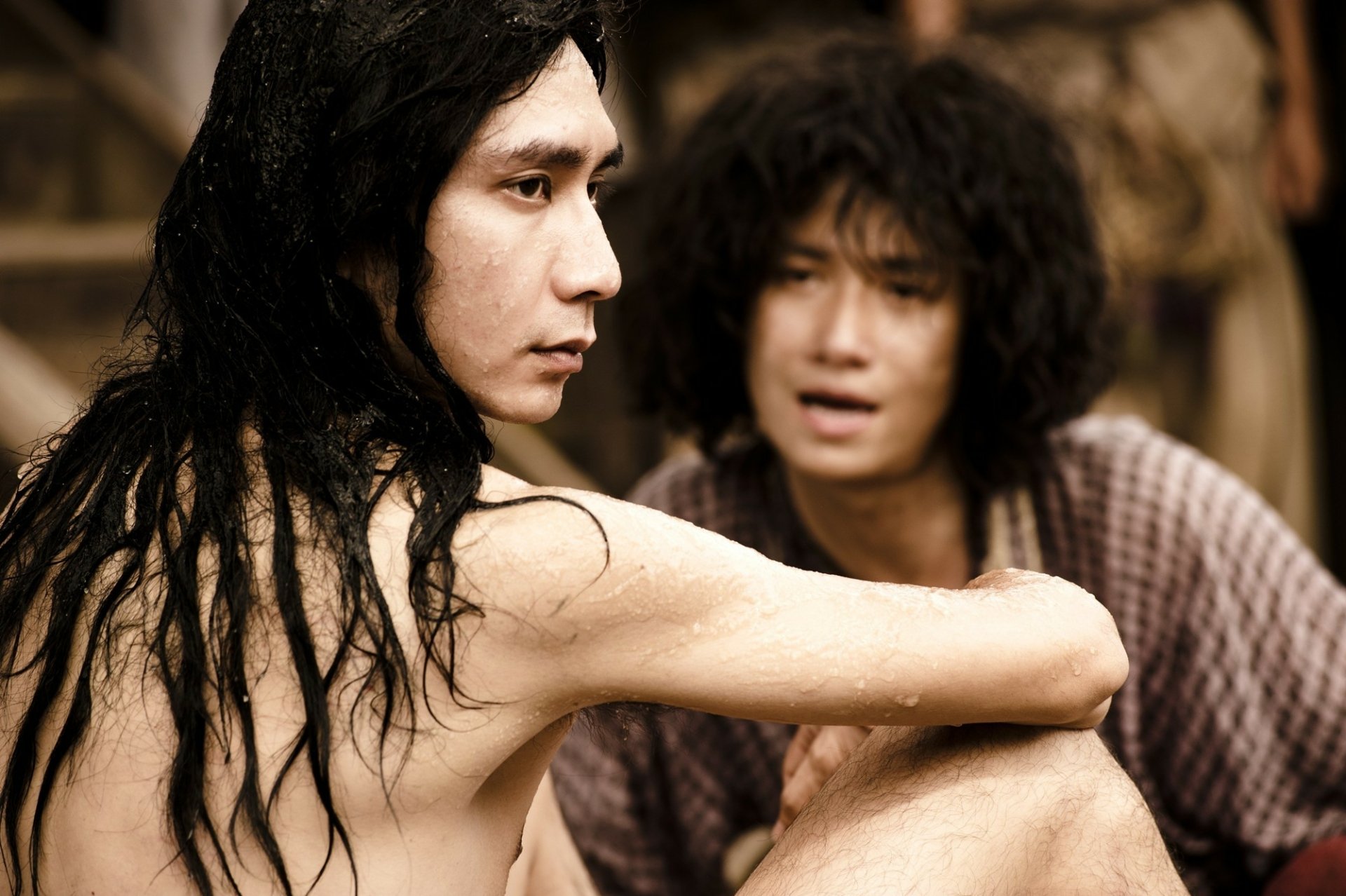 A HD desktop wallpaper featuring characters from Journey To The West, capturing an intense moment between two figures with striking expressions and intricate details.