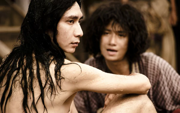 A HD desktop wallpaper featuring characters from Journey To The West, capturing an intense moment between two figures with striking expressions and intricate details.