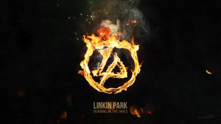 A HD desktop wallpaper featuring Linkin Park's logo made of fire against a dark background. The text Linkin Park Burning in the Skies is displayed below. The image embodies intensity and energy.