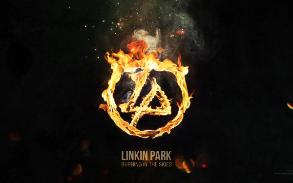 A HD desktop wallpaper featuring Linkin Park's logo made of fire against a dark background. The text Linkin Park Burning in the Skies is displayed below. The image embodies intensity and energy.