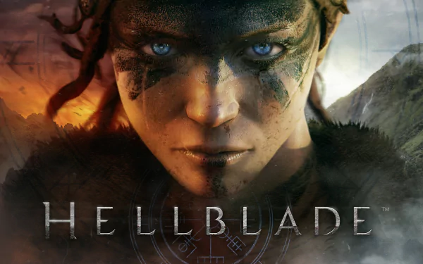 Close-up of Senua from the video game Hellblade: Senua's Sacrifice, featured in an HD PC desktop wallpaper with intense, focused expression and dark, warpainted face.