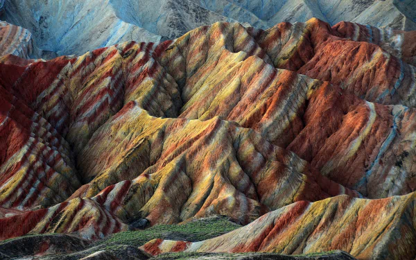 HD PC desktop wallpaper showcasing the vibrant, multicolored mountain formations in China’s natural landscape.