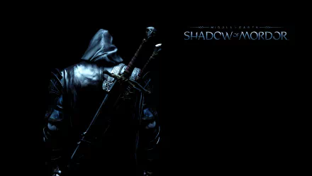 HD desktop wallpaper featuring a hooded character with two swords on their back, promoting the video game Middle-earth: Shadow of Mordor. Text of the game's title appears in the upper right.