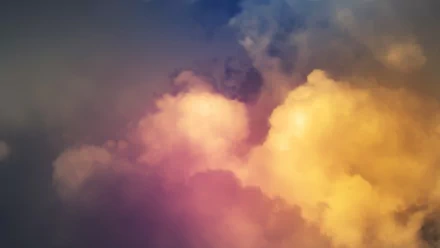 HD PC desktop wallpaper showcasing a vibrant sky with glowing clouds in warm hues blending into darker night tones, capturing the beauty of nature.