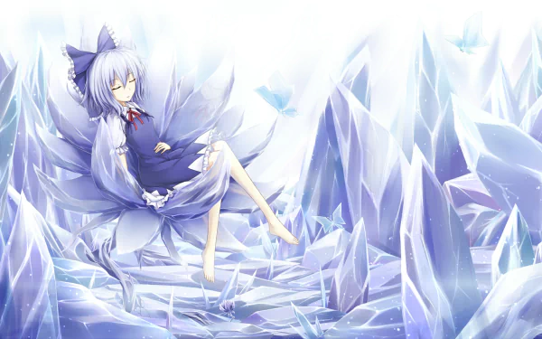 Cirno (Touhou) anime character with silver hair and ice wings reclining on crystalline ice, surrounded by towering ice shards — HD PC desktop wallpaper/background.