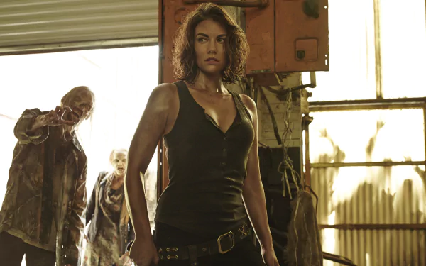 Maggie Greene, portrayed by Lauren Cohan in The Walking Dead, stands confidently against a backdrop of approaching zombies in this gripping HD wallpaper.