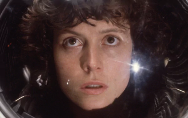 Close-up of Sigourney Weaver in a spacesuit from the movie Alien, featured as an HD PC desktop wallpaper and background.