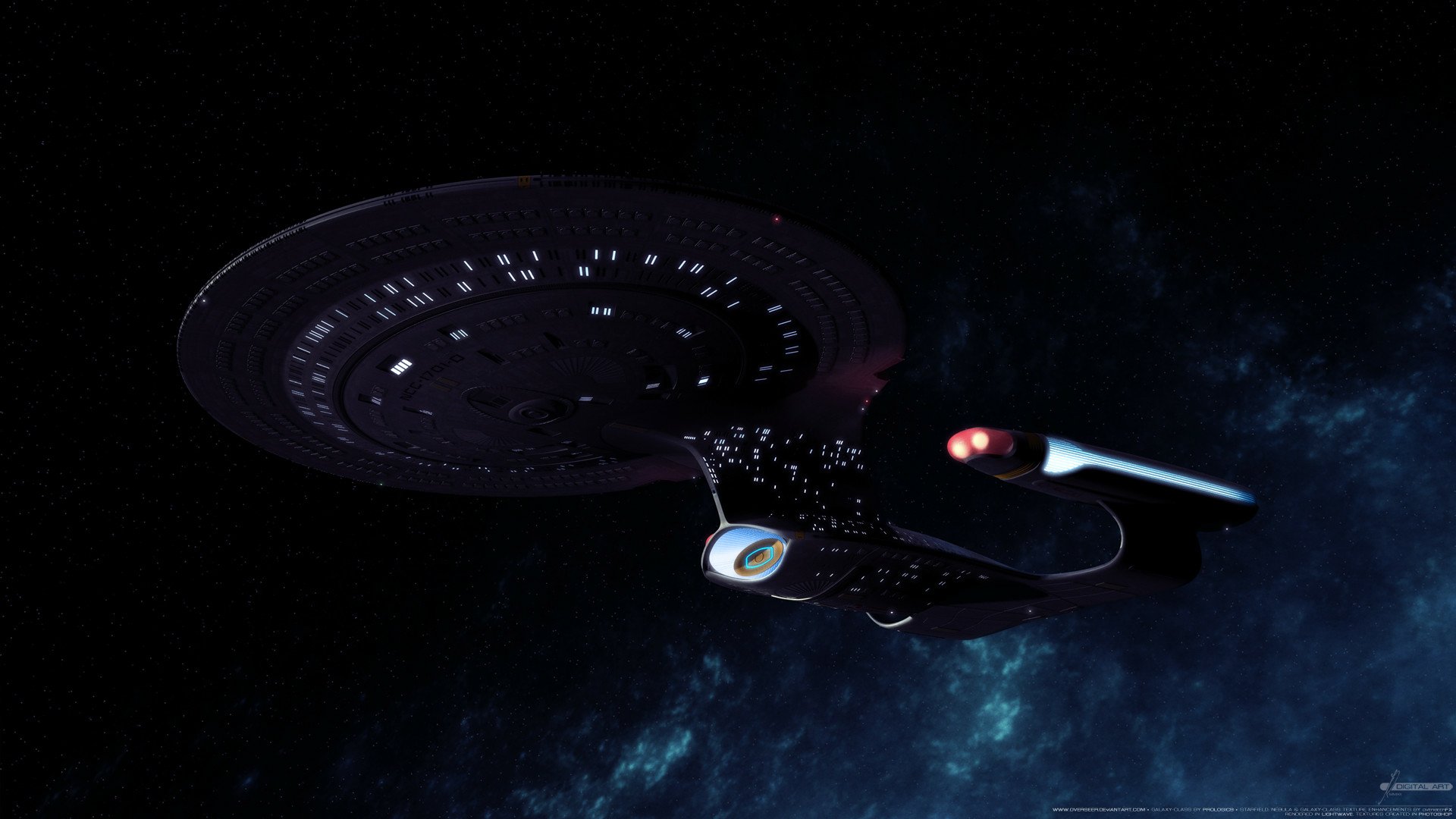 HD PC desktop wallpaper of the TV show Star Trek: The Next Generation — the USS Enterprise‑D gliding past a blue nebula against a starry backdrop.