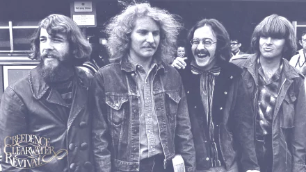 Black-and-white HD desktop wallpaper featuring the members of Creedence Clearwater Revival, capturing the iconic rock band's relaxed and smiling poses.