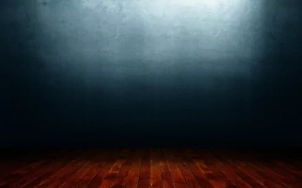 A HD PC desktop wallpaper featuring a wooden floor beneath a textured gray wall, illuminated from above, creating a dramatic and modern atmosphere.