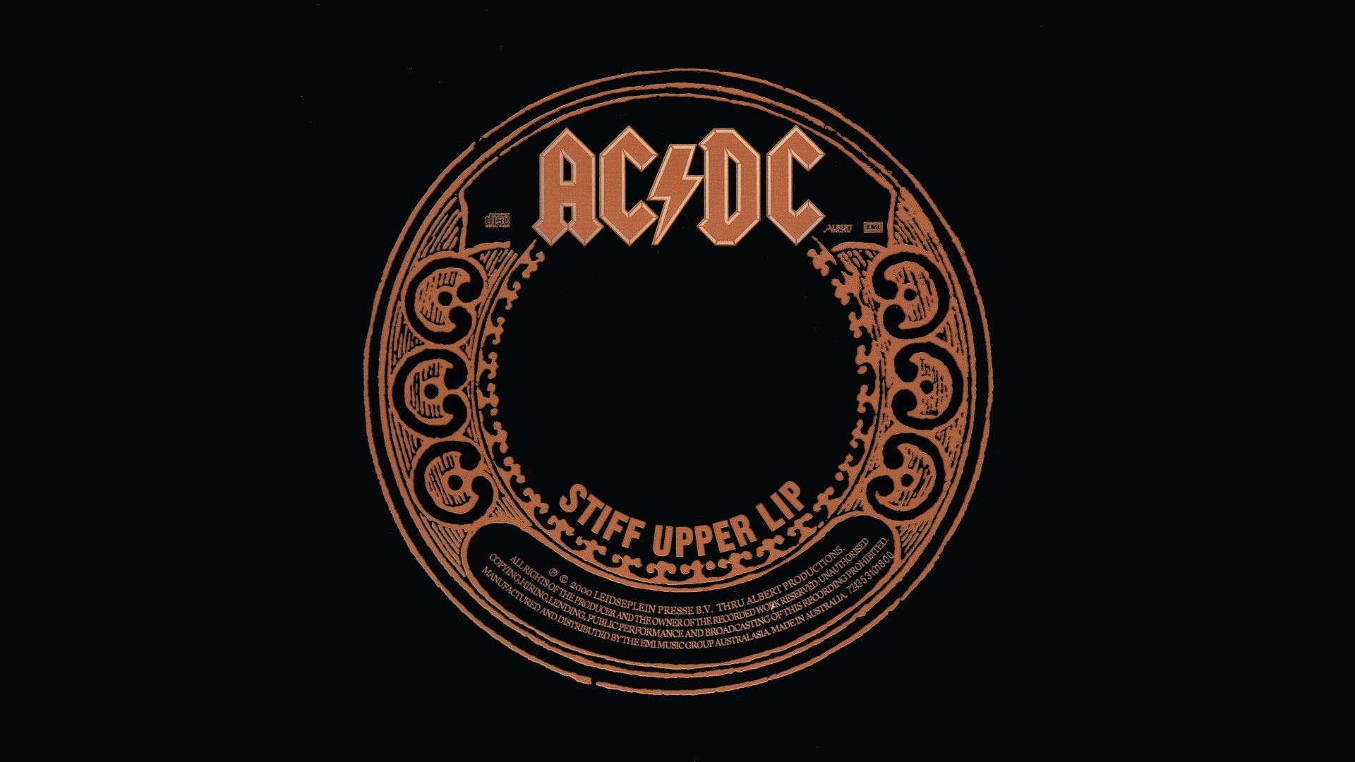 AC/DC band logo with Stiff Upper Lip text in orange on a black background, designed as a 4K Ultra HD music-themed desktop wallpaper.